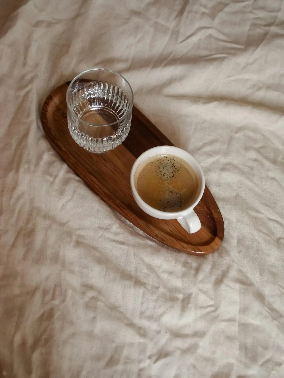 glass of water and coffee cup morning routine