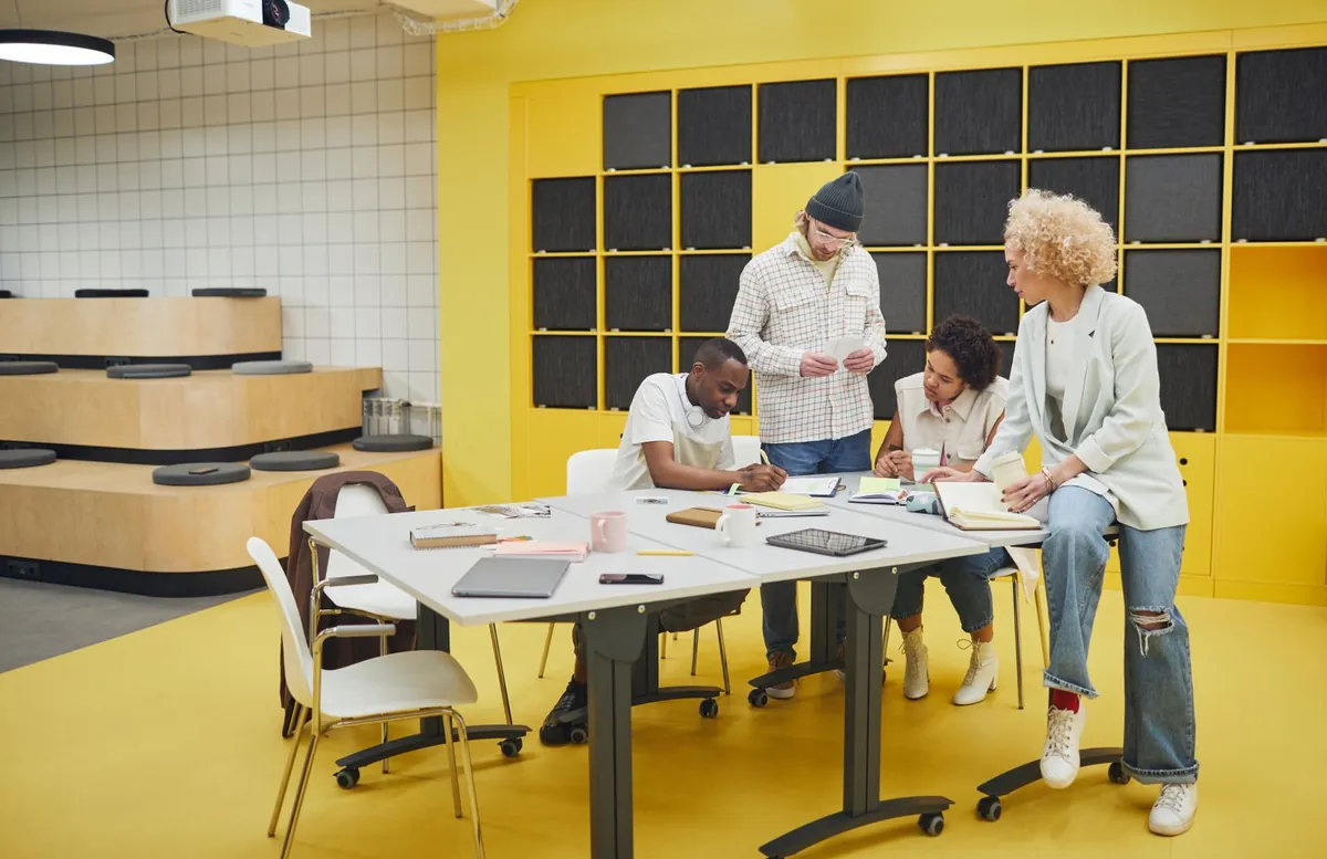 diverse team meeting collaborating in modern office