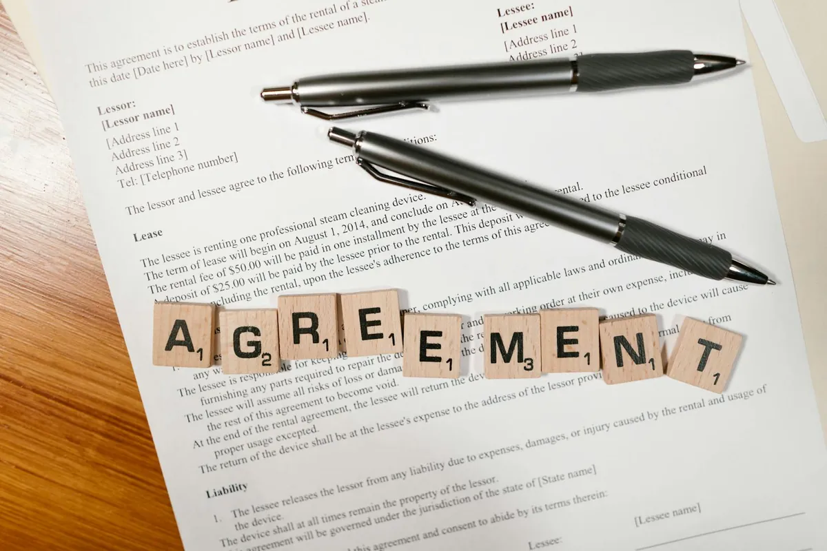 offer letter document with pen signing