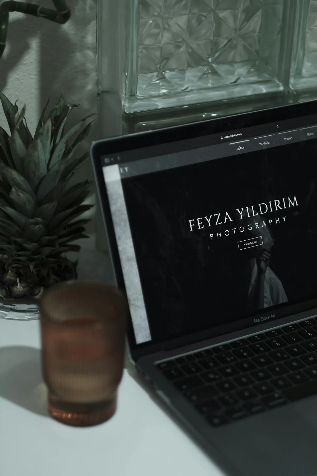 portfolio website mockup on laptop screen