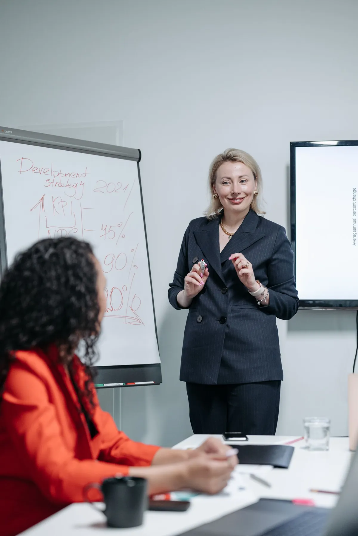 smiling professional confident at work meeting presenting