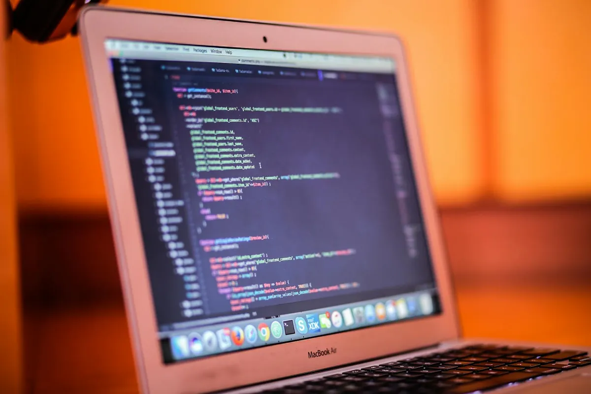 coding bootcamp student laptop with VS Code open