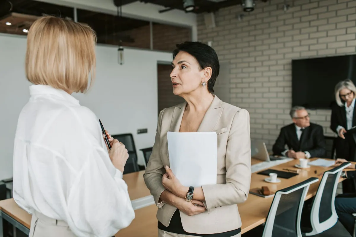 professional woman in office negotiating salary meeting