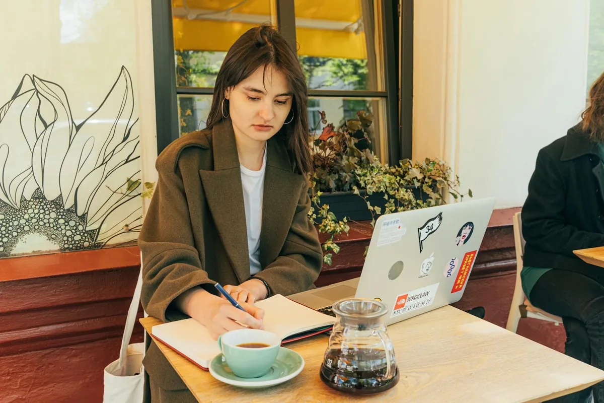 remote worker laptop coffee shop UK